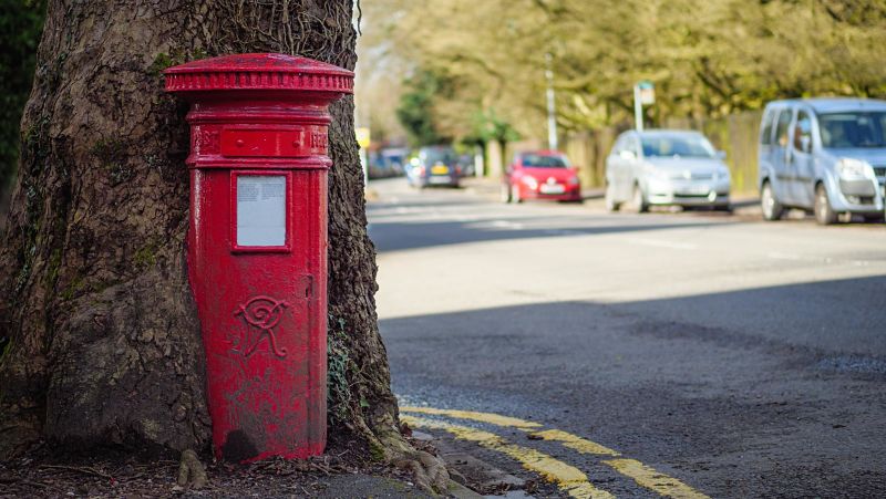 British Postbox Growing in Tree